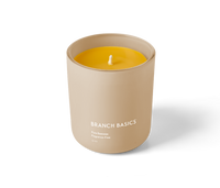 A Branch Basics 100% Beeswax Candle, housed in a glass jar with an organic cotton wick, displayed on a transparent background. - Thumbnail View 2

